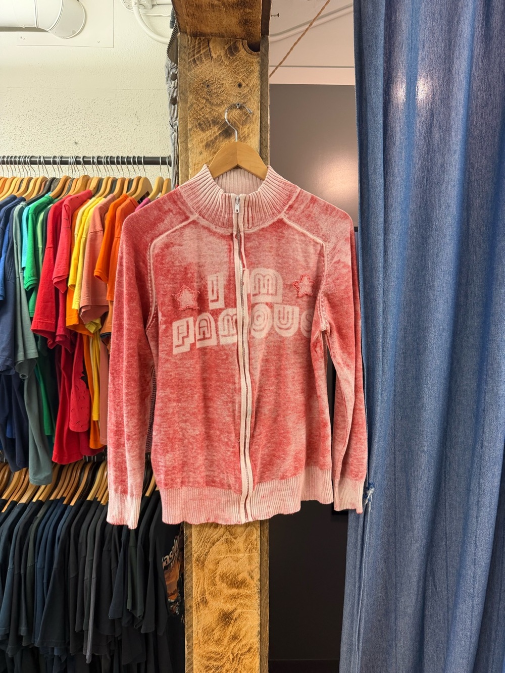 Vintage “I’m famous” faded red graphic women’s sweater